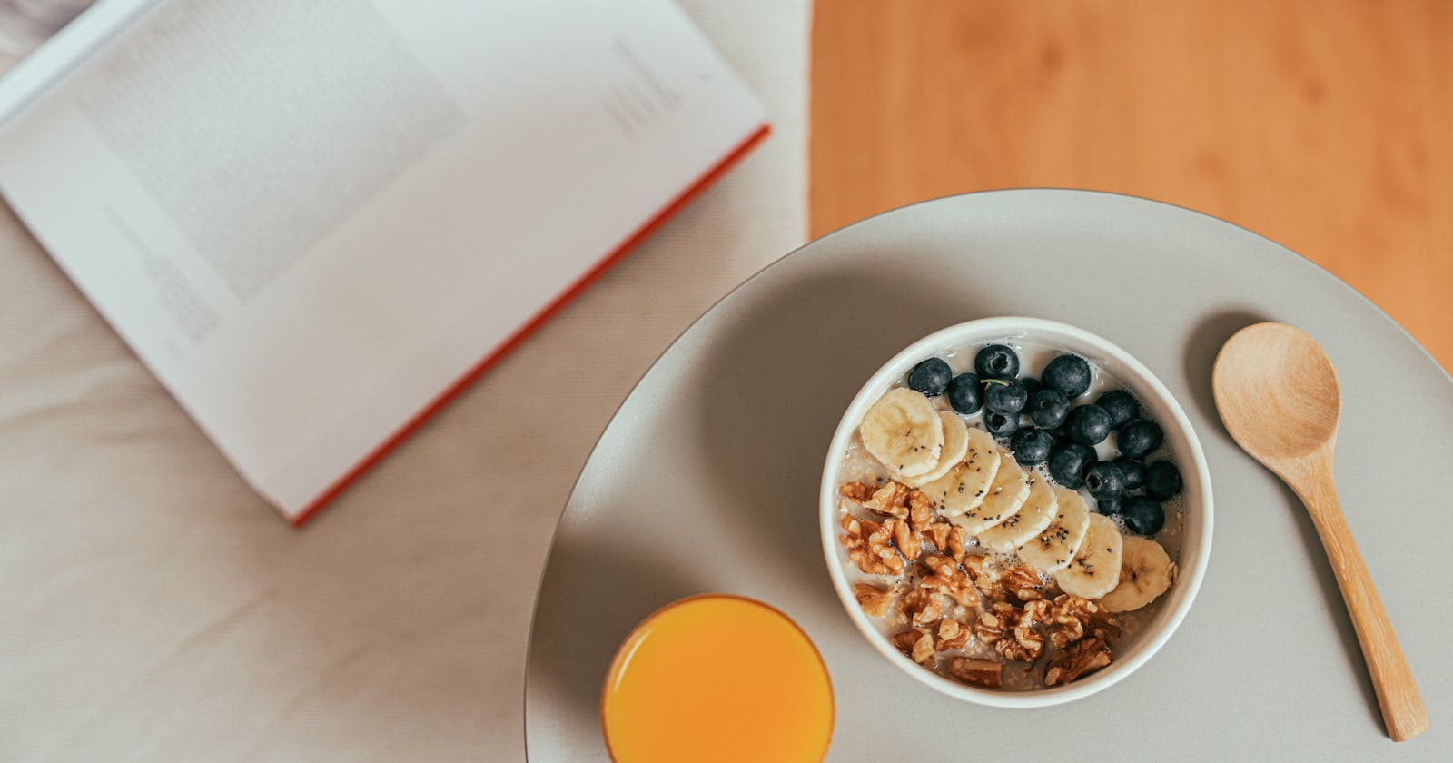 Bright breakfast tray with oatmeal and fruit — sattvic eating in plain sight
