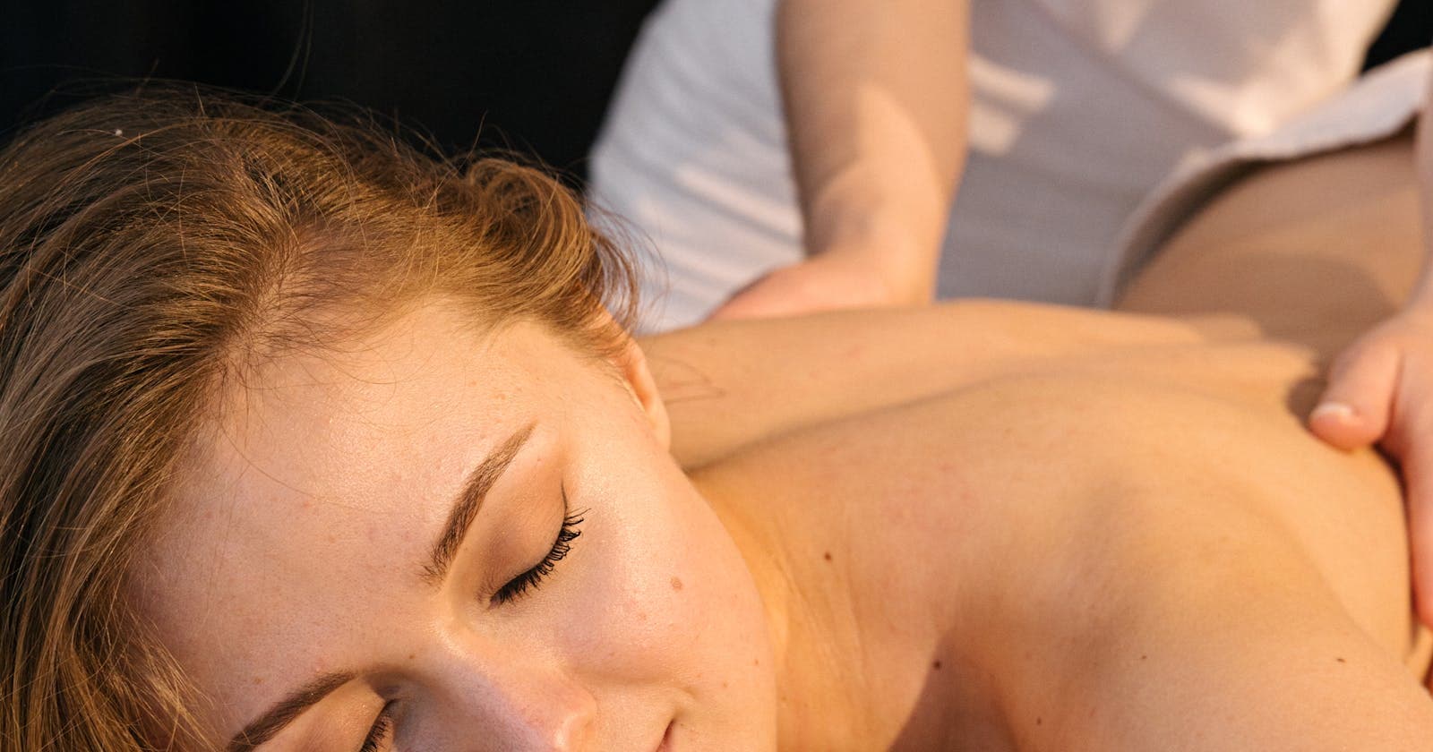 Person receiving a long, steady oil massage, the rhythm of abhyanga