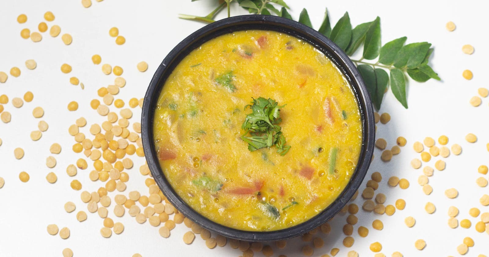 Bowl of yellow Indian lentil soup, Ayurveda's everyday digestion food