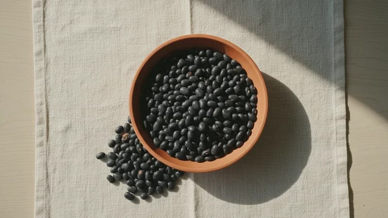 Black Beans (Krishna Rajmasha) — whole and prepared form, top-down still life