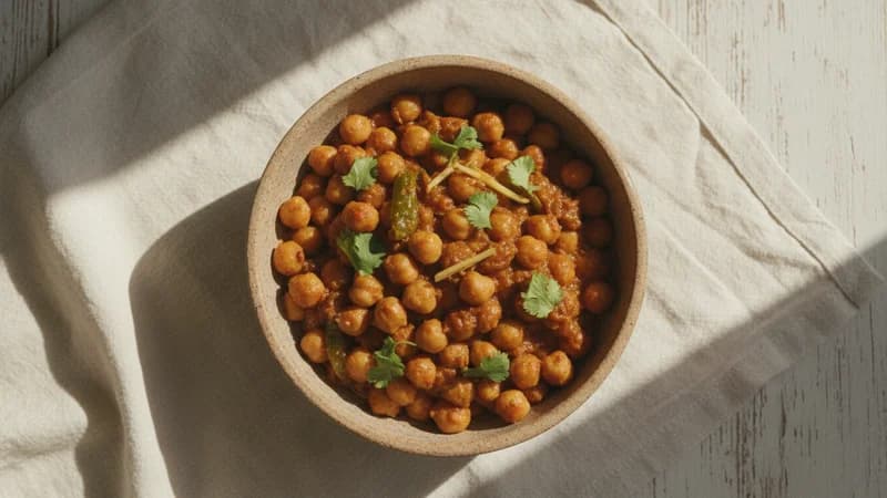 Chana Masala (Chanaka Masala) — whole and prepared form, top-down still life